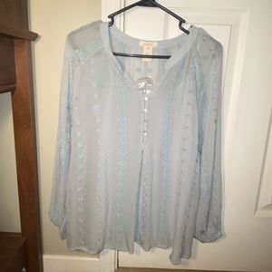 Pale blue blouse with embroidery detail